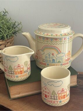 1982 Enesco "Home Sweet Home" cream ceramic teapot creamer & cup cross stitch